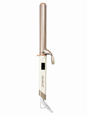 Close-up of hair wrapped around the SKINCE 22 mm curling iron